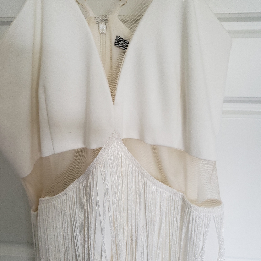 CREAM JUMPSUIT WITH FRINGE